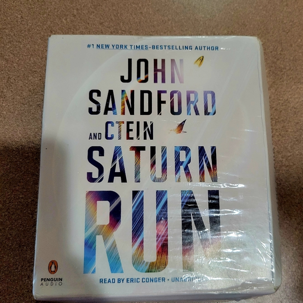 New book on CD. Saturn Run by John Sandford and Ctein